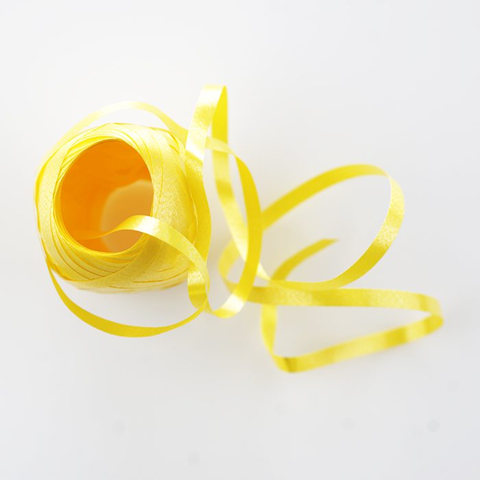 Presentsnöre på rulle gul