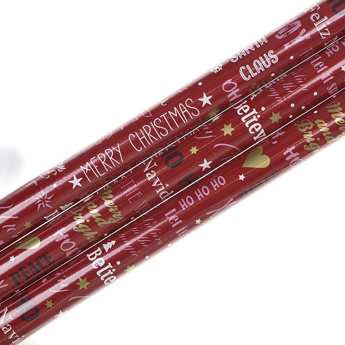 Presentpapper, julpapper med hela 5 meter på rullen. Med mönster rött med guld, vitt och rosa text