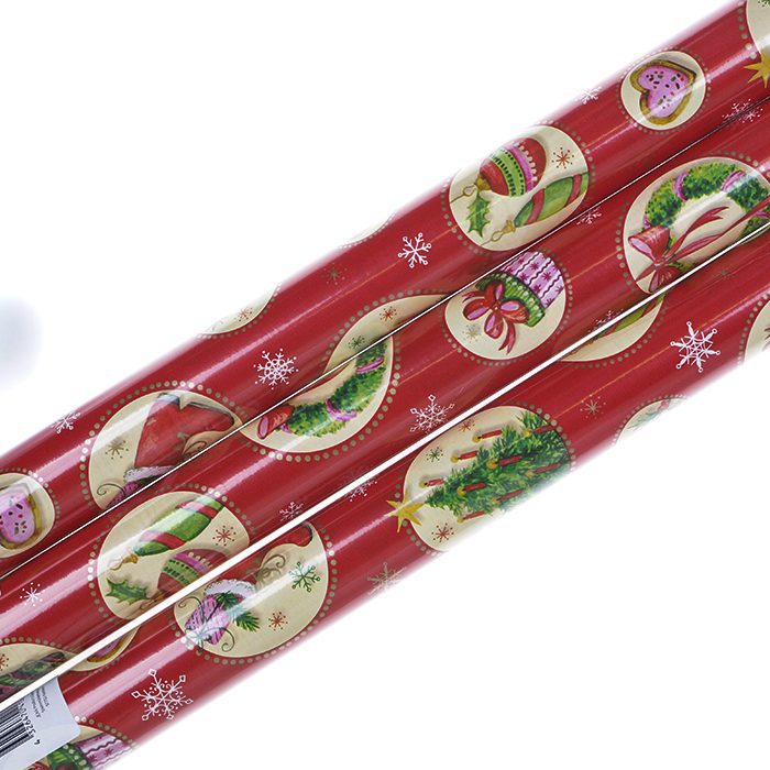 Presentpapper, julpapper med hela 5 meter på rullen. Med mönster rött med cirklar