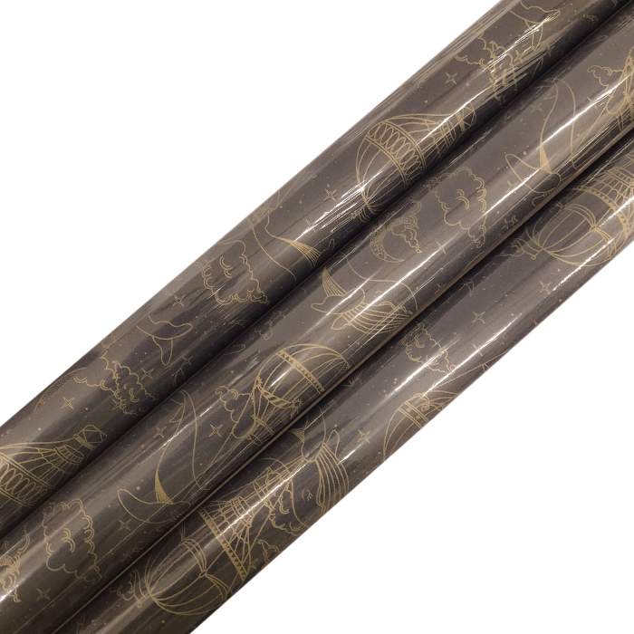 Svart presentpapper med luftballonger i guld